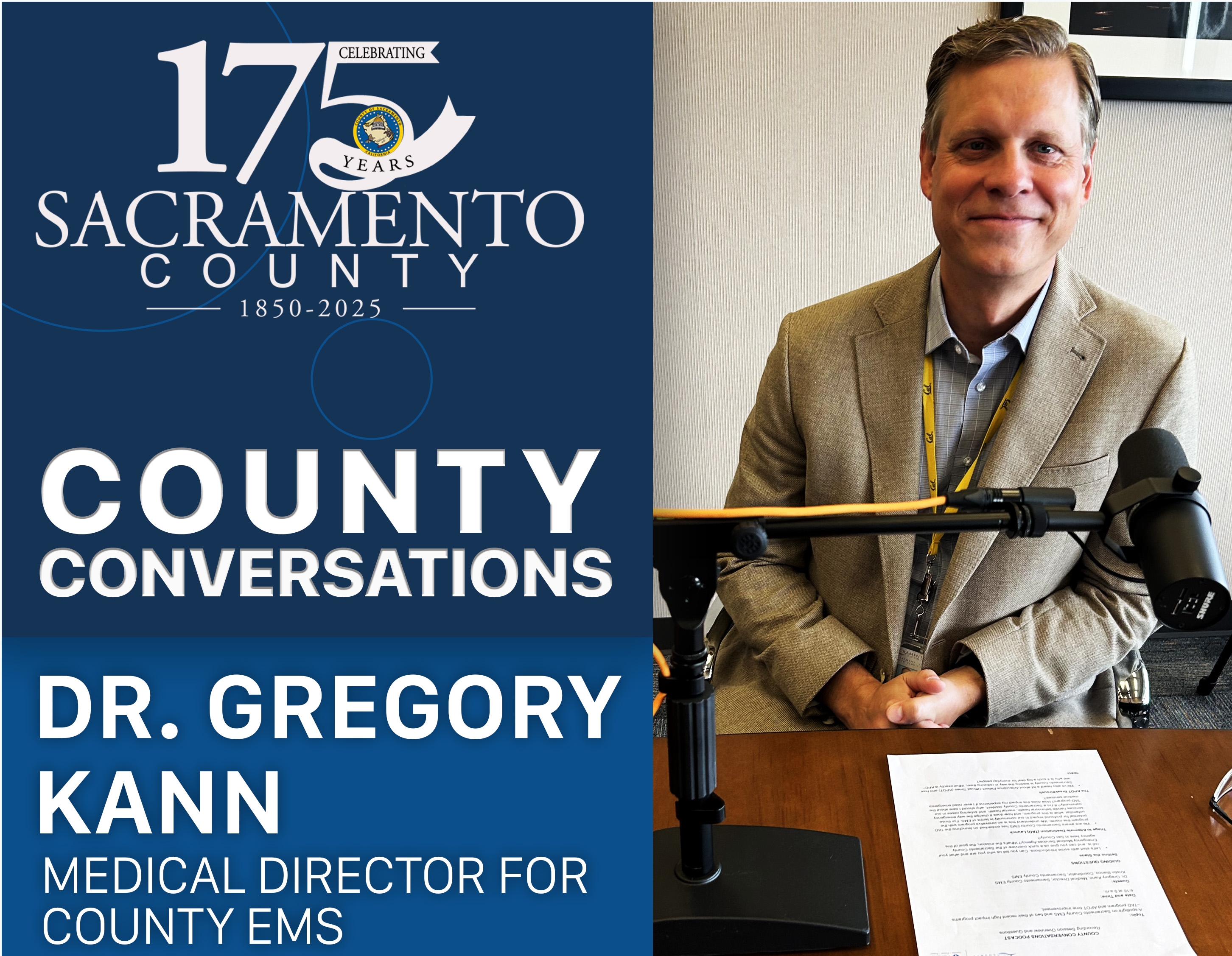 Doctor Gregory Kann sitting at a podcast desk